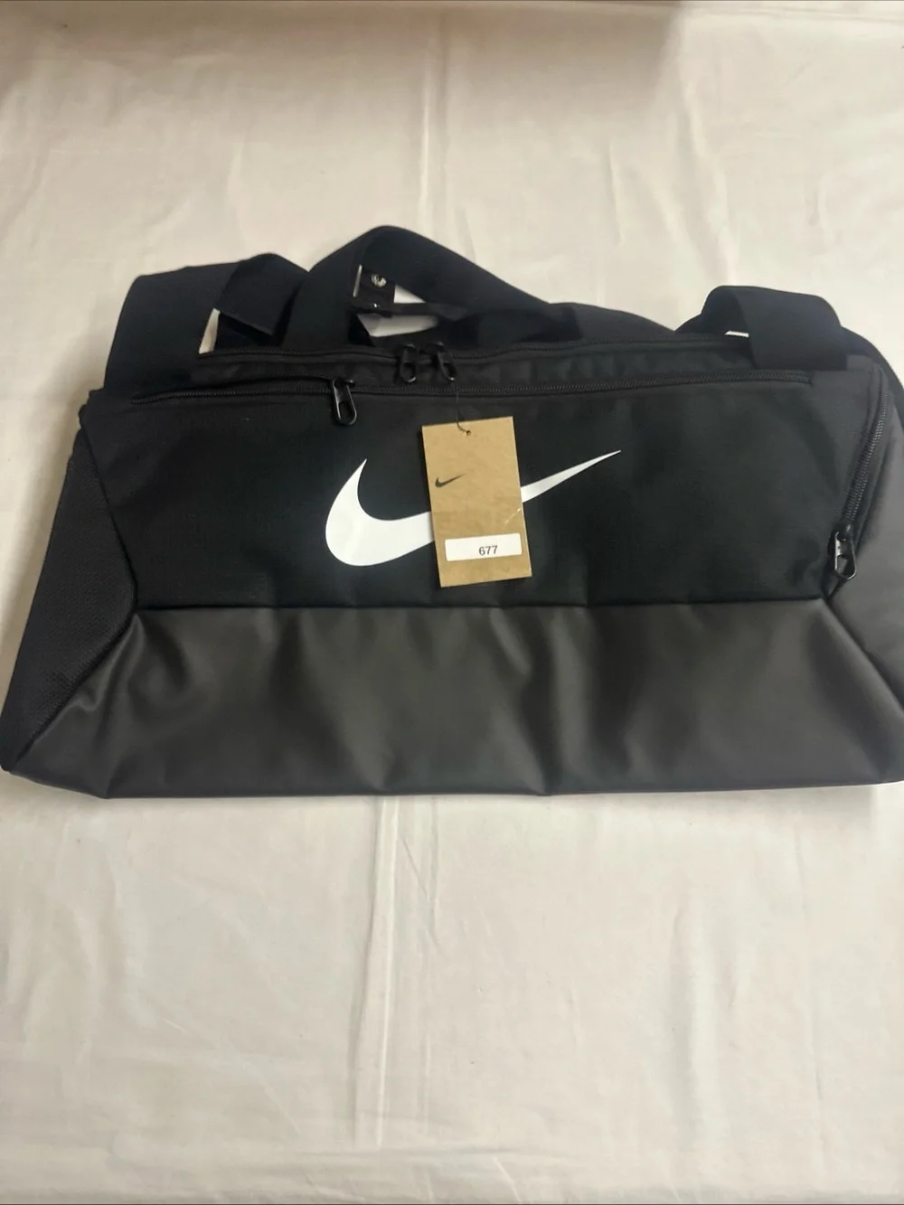 Nike Black Duffel Bag with White Swoosh Logo